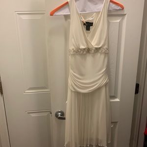 Connected apparel wedding dress, size 6 beige in color